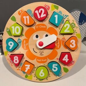 Hape wood clock puzzle